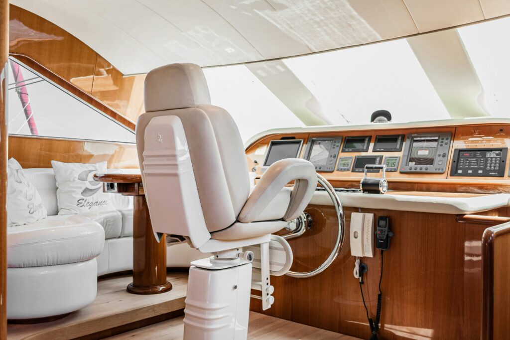 Elegant super yacht interior, showcasing refined decor and spacious layout, embodying luxury and comfort on the sea.